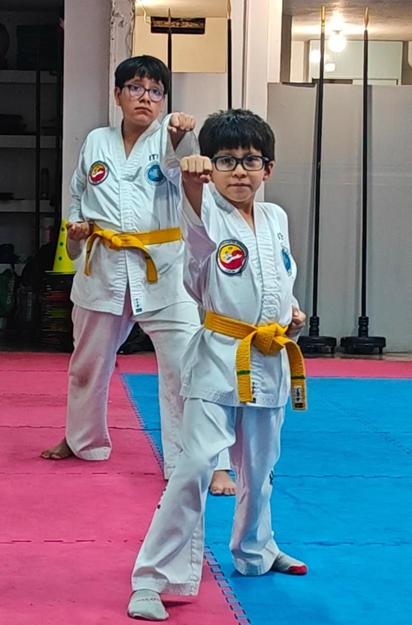 Ignacio junto a su instructor